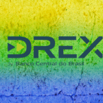 DREX a moeda digital do Brasil segue em testes. Na imagem temos as cores azul, amarelo e verde e a logo do DREX ao centro.